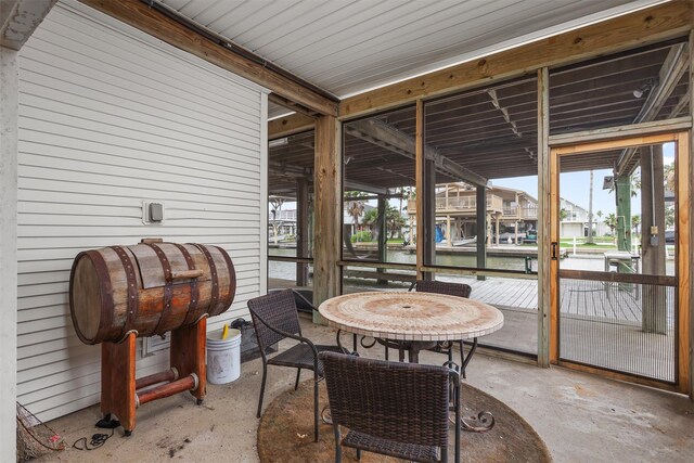 3802 Tidewater, Galveston, TX 77554 - sunroom with plenty of natural light and a water view