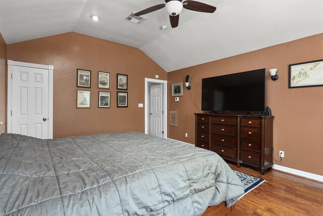 3802 Tidewater, Galveston, TX 77554 - bedroom featuring lofted ceiling, wood finished floors, ceiling fan, and baseboards