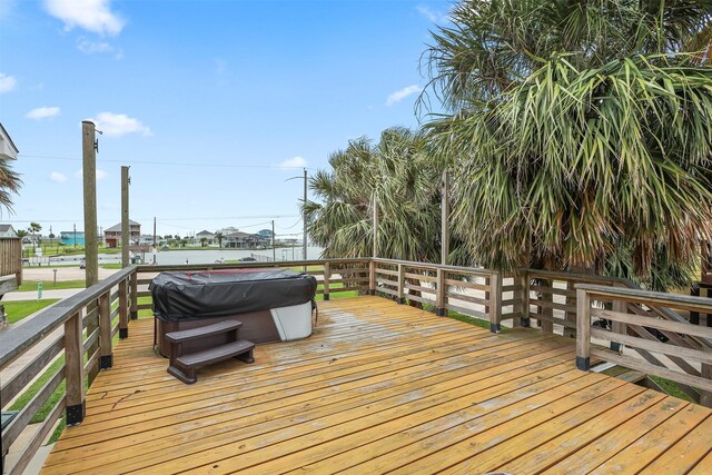 3802 Tidewater, Galveston, TX 77554 - wooden deck featuring a hot tub