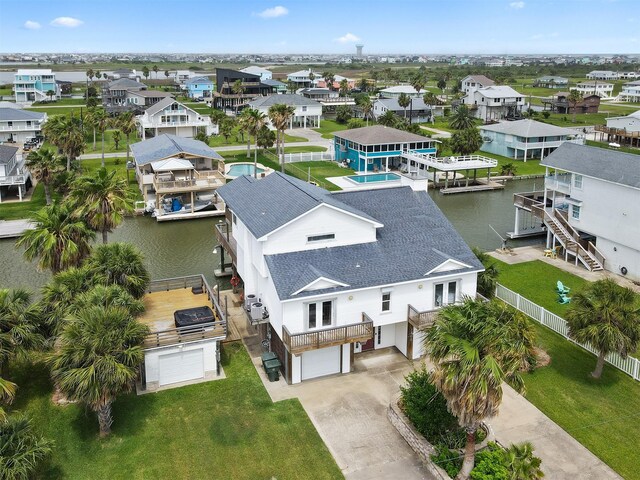 3802 Tidewater, Galveston, TX 77554 - aerial view of residential area featuring a nearby body of water