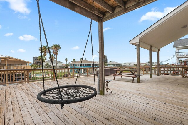 3802 Tidewater, Galveston, TX 77554 - wooden terrace featuring a residential view