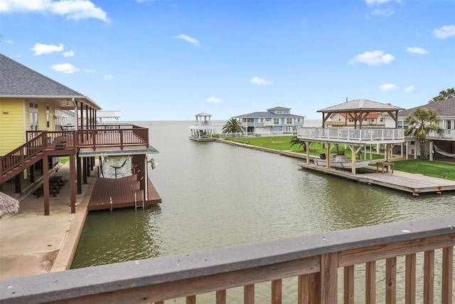 3802 Tidewater, Galveston, TX 77554 - dock featuring a water view, stairway, and a gazebo