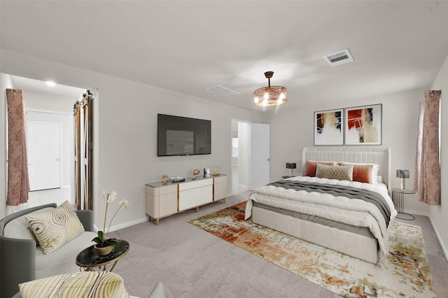 carpeted bedroom featuring baseboards