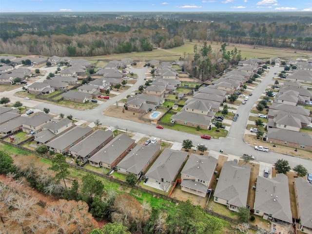 aerial view of residential area with a forest