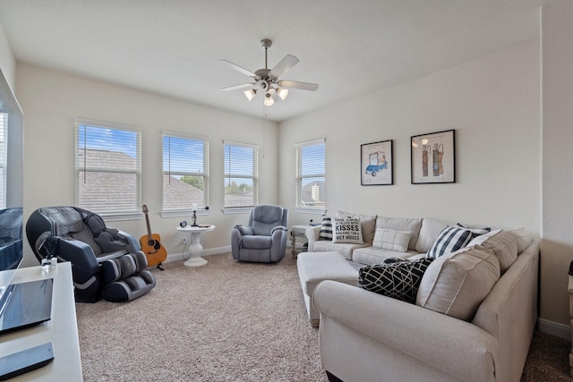 202 Bentwater Ln, Clute, TX 77531 - living area featuring carpet floors, ceiling fan, and baseboards