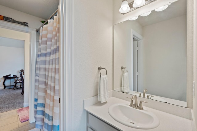 202 Bentwater Ln, Clute, TX 77531 - full bath with vanity, a shower with curtain, and tile patterned floors