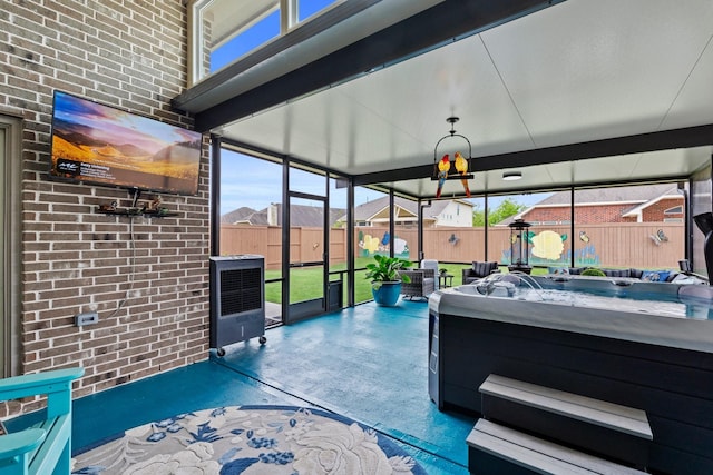 202 Bentwater Ln, Clute, TX 77531 - sunroom with a hot tub and healthy amount of natural light
