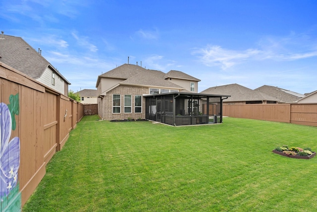 202 Bentwater Ln, Clute, TX 77531 - rear view of property featuring a sunroom and brick siding