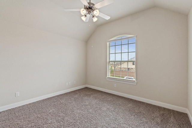 202 Bentwater Ln, Clute, TX 77531 - carpeted empty room featuring vaulted ceiling, baseboards, and ceiling fan