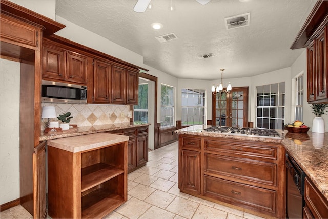 kitchen featuring stainless steel appliances, backsplash, a textured ceiling, a peninsula, and open shelves