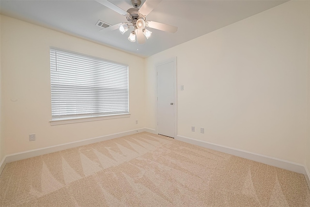 3722 Main Poplar Dr, Houston, TX 77025 - unfurnished room with light colored carpet, baseboards, and a ceiling fan