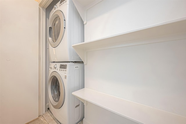 3722 Main Poplar Dr, Houston, TX 77025 - washroom featuring stacked washing machine and dryer