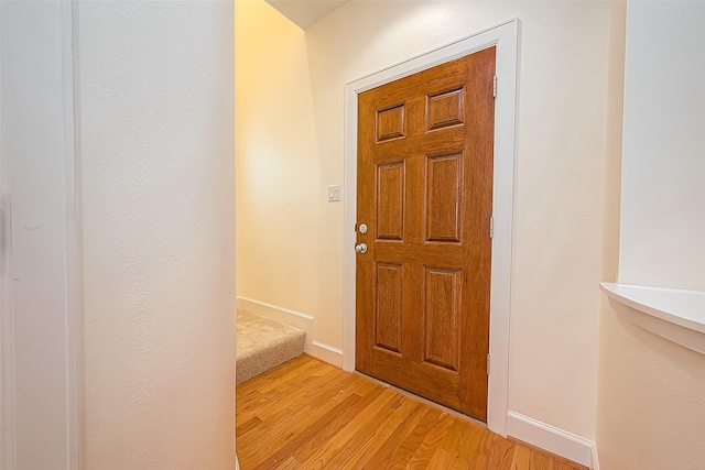 3722 Main Poplar Dr, Houston, TX 77025 - foyer featuring light wood finished floors and baseboards