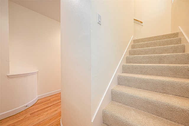 3722 Main Poplar Dr, Houston, TX 77025 - stairs with wood finished floors and baseboards