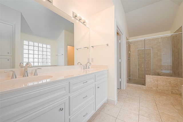 3722 Main Poplar Dr, Houston, TX 77025 - bathroom featuring tile patterned flooring, a shower stall, double vanity, and baseboards