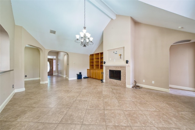 7810 Broken Arrow St, Baytown, TX 77521 - unfurnished living room with arched walkways, a chandelier, light tile patterned floors, high vaulted ceiling, and baseboards