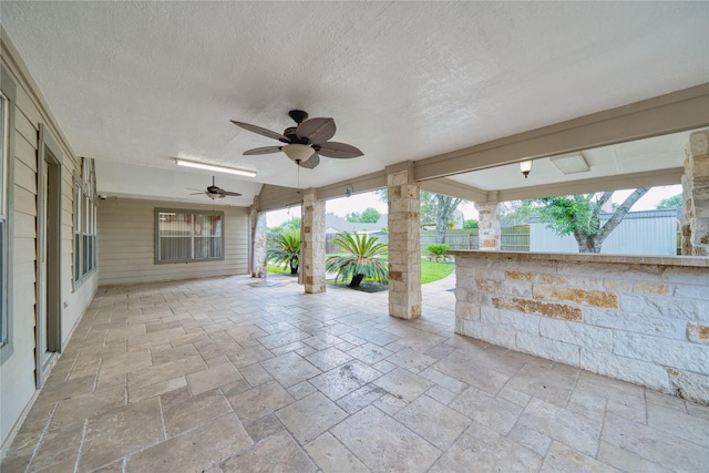 7810 Broken Arrow St, Baytown, TX 77521 - view of patio / terrace featuring ceiling fan and fence