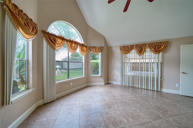 7810 Broken Arrow St, Baytown, TX 77521 - empty room featuring lofted ceiling, ceiling fan, tile patterned flooring, and baseboards