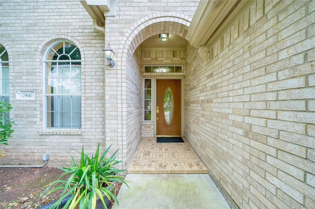 7810 Broken Arrow St, Baytown, TX 77521 - property entrance featuring brick siding