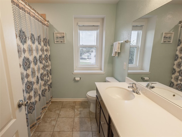 2786 Cayden Creek Way, Conroe, TX 77304 - bathroom featuring healthy amount of natural light, toilet, vanity, and tile patterned floors