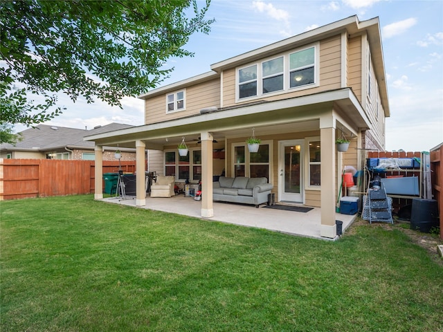 2786 Cayden Creek Way, Conroe, TX 77304 - back of property featuring a patio area, outdoor lounge area, and ceiling fan