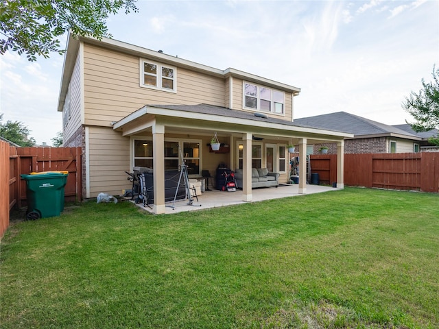 2786 Cayden Creek Way, Conroe, TX 77304 - back of house with a patio area, an outdoor living space, and a ceiling fan
