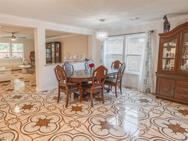 2786 Cayden Creek Way, Conroe, TX 77304 - dining room with a chandelier, baseboards, crown molding, ceiling fan, and light tile patterned floors
