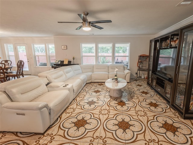 2786 Cayden Creek Way, Conroe, TX 77304 - tiled living area with ceiling fan and crown molding