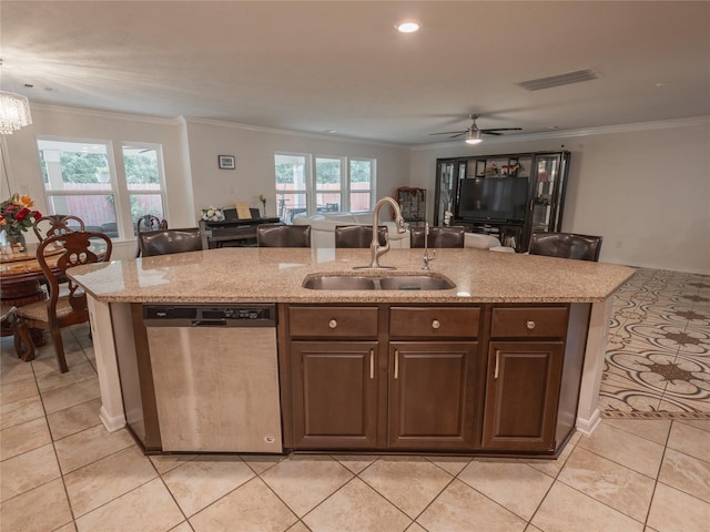 2786 Cayden Creek Way, Conroe, TX 77304 - kitchen featuring stainless steel dishwasher, a sink, an island with sink, crown molding, and a ceiling fan