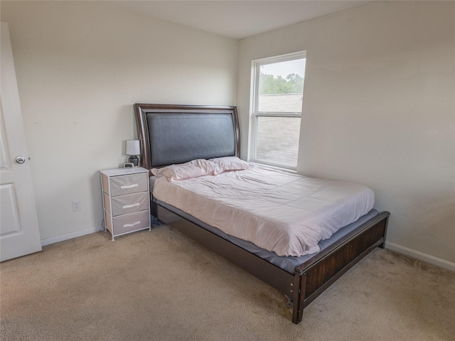 2786 Cayden Creek Way, Conroe, TX 77304 - bedroom with light colored carpet and baseboards
