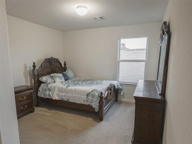 2786 Cayden Creek Way, Conroe, TX 77304 - bedroom featuring light carpet and baseboards