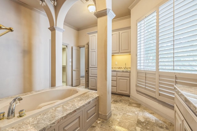 21 Aston Gln, San Antonio, TX 78257 - full bath with ornate columns, ornamental molding, a garden tub, plenty of natural light, and stone finish flooring