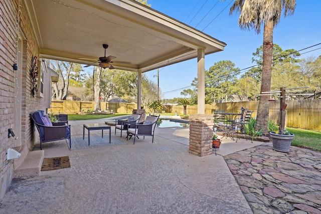 13102 Lake Mist Dr, Cypress, TX 77429 - fenced backyard with ceiling fan and a patio