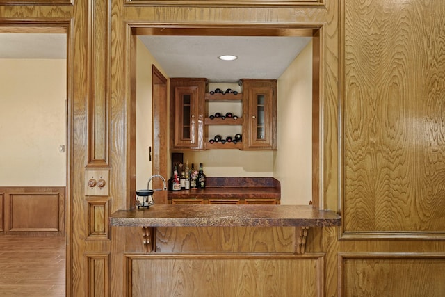 13102 Lake Mist Dr, Cypress, TX 77429 - indoor dry bar featuring wainscoting and wood finished floors