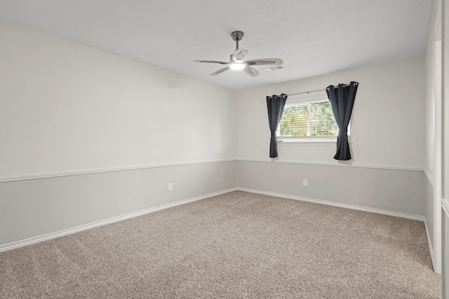 13102 Lake Mist Dr, Cypress, TX 77429 - spare room with a ceiling fan, carpet floors, and baseboards