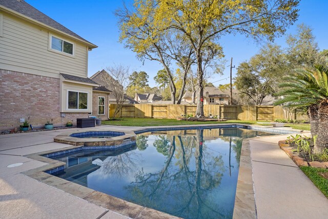 13102 Lake Mist Dr, Cypress, TX 77429 - view of swimming pool with a fenced backyard and a pool with connected hot tub