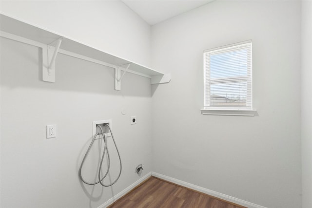 3907 Lynnfield St, Houston, TX 77016 - laundry room featuring dark wood-style floors, hookup for an electric dryer, washer hookup, and baseboards