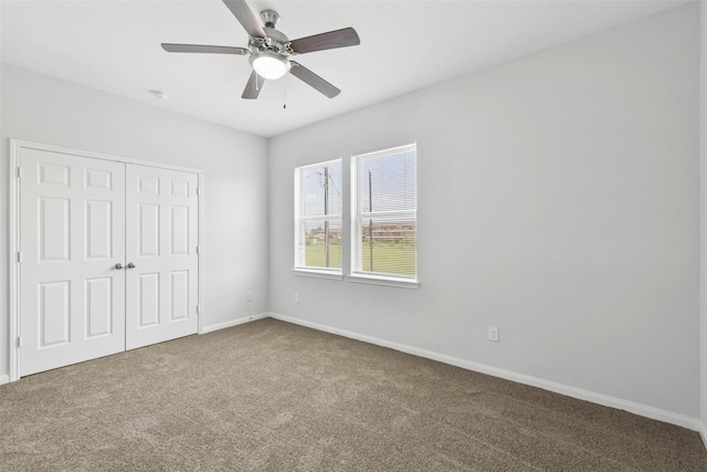 3907 Lynnfield St, Houston, TX 77016 - unfurnished bedroom featuring carpet floors, a closet, baseboards, and ceiling fan