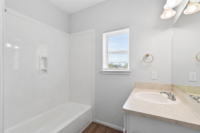 3907 Lynnfield St, Houston, TX 77016 - full bath with vanity, wood finished floors, and shower / washtub combination