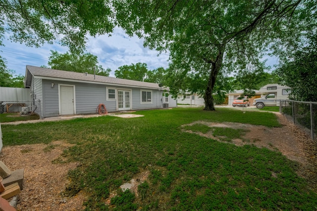 1402 W Norris, El Campo, TX 77437 - back of property with french doors