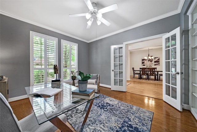 19715 Satinwood Trl, Humble, TX 77346 - office area featuring french doors, crown molding, wood finished floors, a chandelier, and ceiling fan