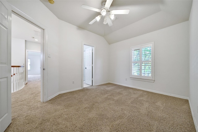 19715 Satinwood Trl, Humble, TX 77346 - empty room featuring carpet flooring, ceiling fan, baseboards, and lofted ceiling