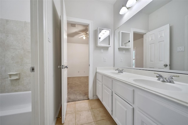 19715 Satinwood Trl, Humble, TX 77346 - full bathroom featuring double vanity, tile patterned floors, and ceiling fan