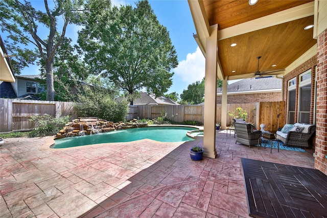 19715 Satinwood Trl, Humble, TX 77346 - view of pool featuring a patio, a fenced backyard, ceiling fan, a pool with connected hot tub, and outdoor lounge area