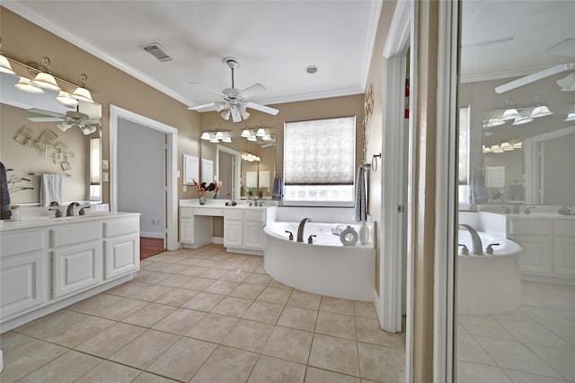 19715 Satinwood Trl, Humble, TX 77346 - bathroom featuring ceiling fan, ornamental molding, tile patterned floors, a garden tub, and two vanities