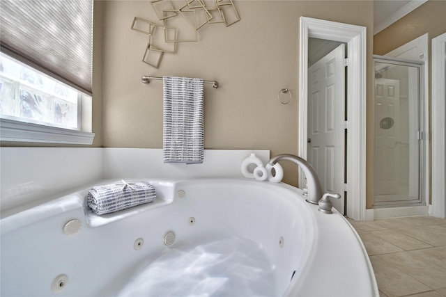 19715 Satinwood Trl, Humble, TX 77346 - bathroom with a stall shower, a tub with jets, and tile patterned flooring