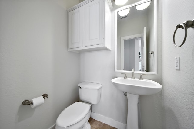 19715 Satinwood Trl, Humble, TX 77346 - bathroom with toilet and baseboards
