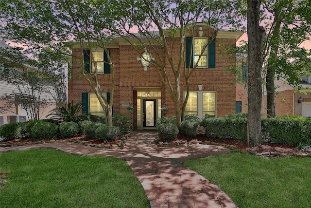 19715 Satinwood Trl, Humble, TX 77346 - view of front of property featuring brick siding and a front lawn
