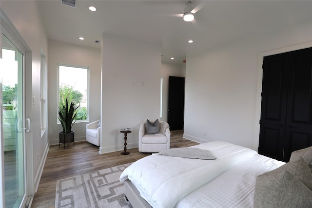 609 E 38th St, Houston, TX 77022 - bedroom featuring light wood-type flooring, recessed lighting, and baseboards