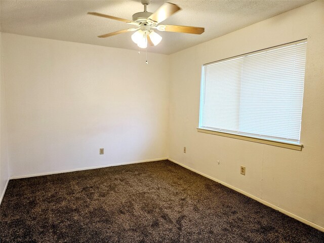 5670 Birchmont Dr Unit C, Houston, TX 77091 - unfurnished room with ceiling fan, carpet, a textured ceiling, and baseboards
